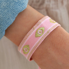 Geweven armband evil eye roze