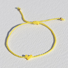 Armband hart twisted botergeel