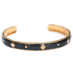 Gold bangle stars black