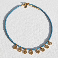 Ketting Miyuki gouden muntjes blauw