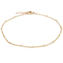 Bracelet de cheville à pois dorés