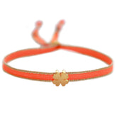 Pulsera tejida trébol naranja