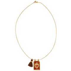 Gold necklace tableau cognac