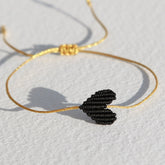 Brazalete corazón negro