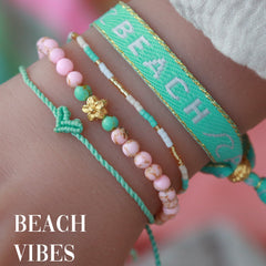 Pulsera tejida de playa