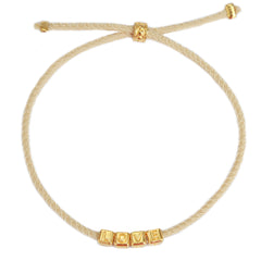 Pulsera del amor dorada y beige