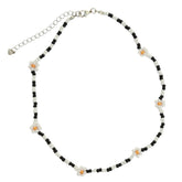 Gargantilla margarita blanca y negra