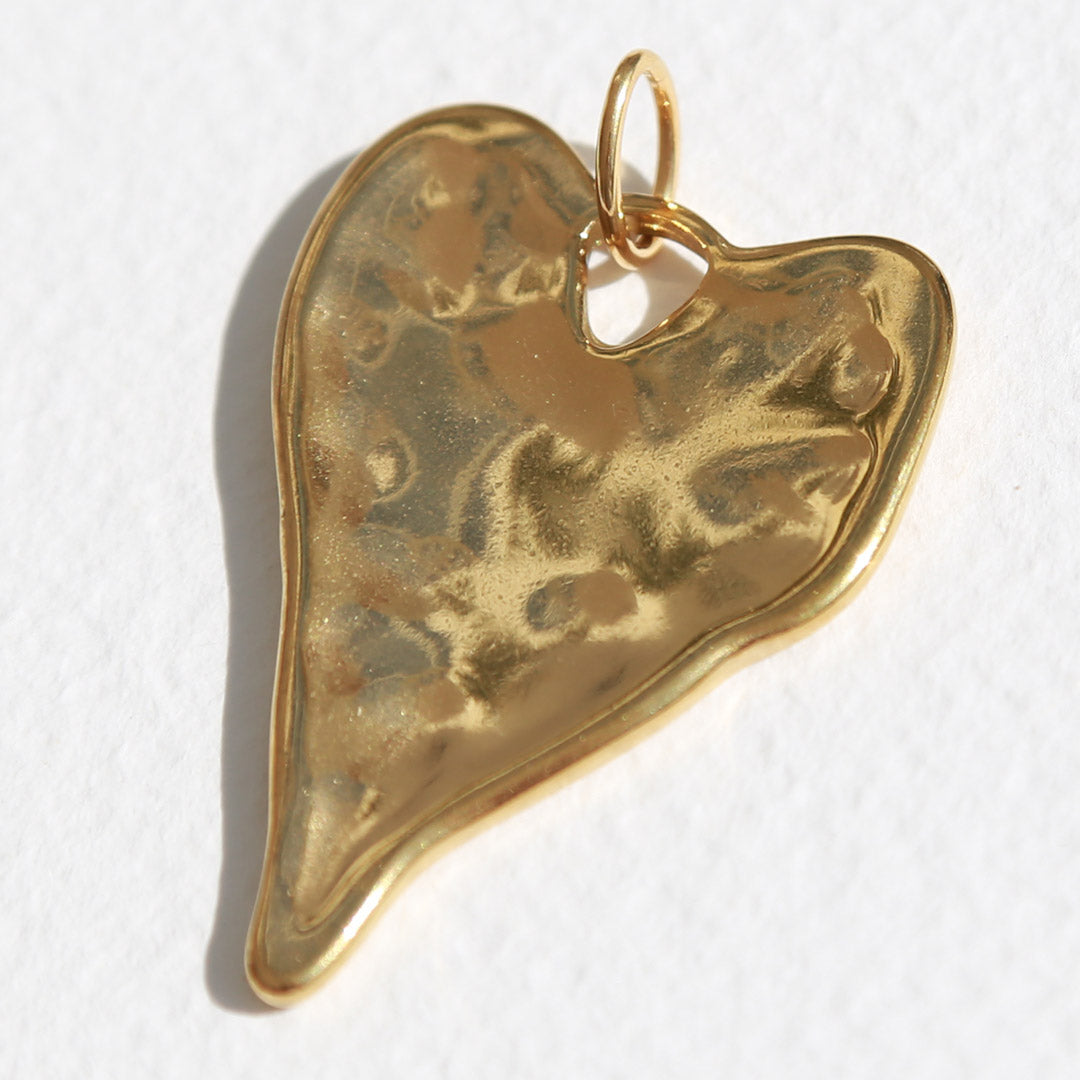 Hammered heart charm