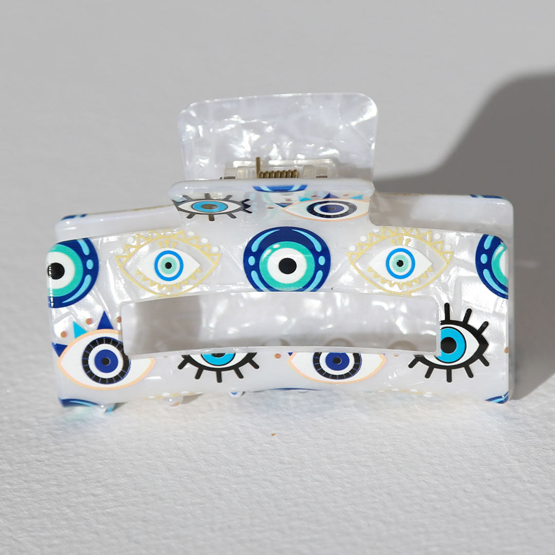 Pinza para el pelo recta de mal de ojo