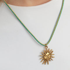 Necklace metallic turquoise sun