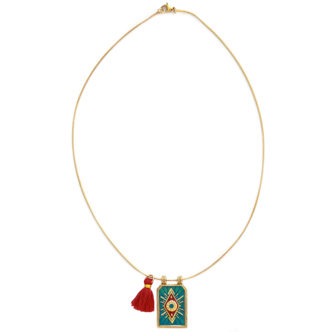 Gold necklace tableau blue
