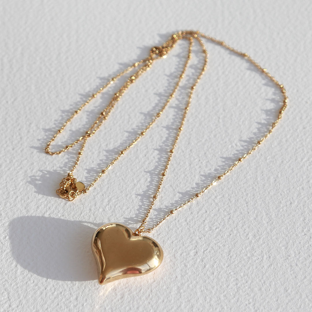 Gouden lange ketting bold heart