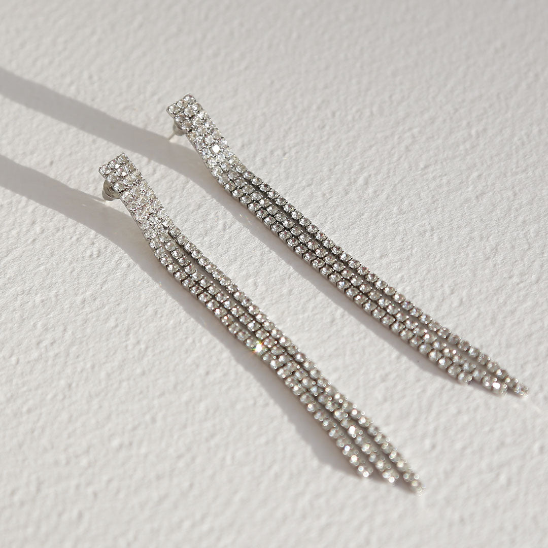 Boucles d'oreilles en or recouvertes de diamants