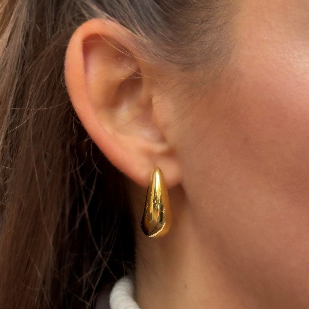 Gouden oorbellen drops
