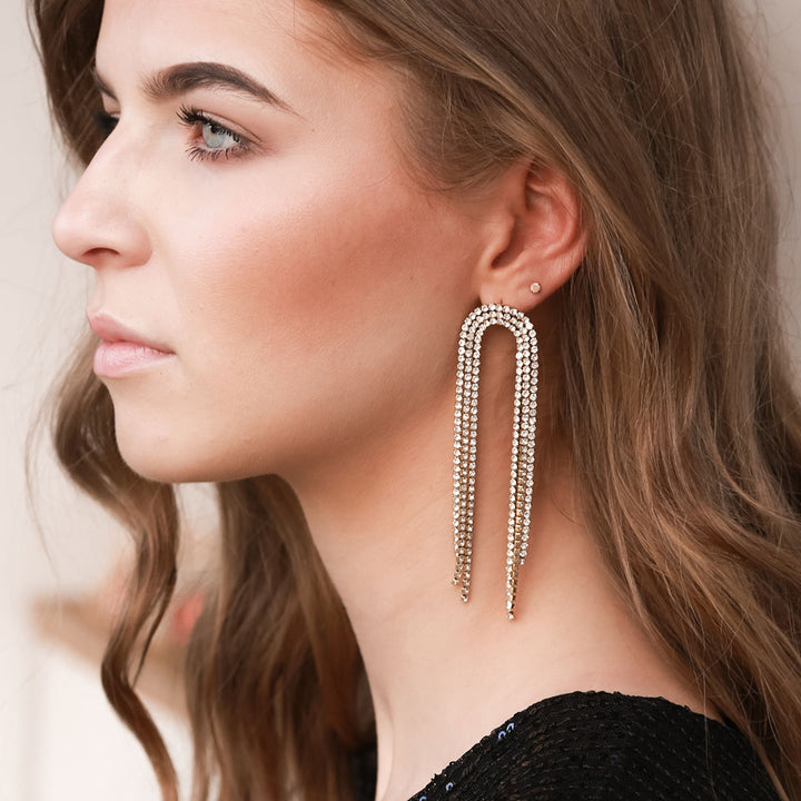 Earrings covered in diamonds oval