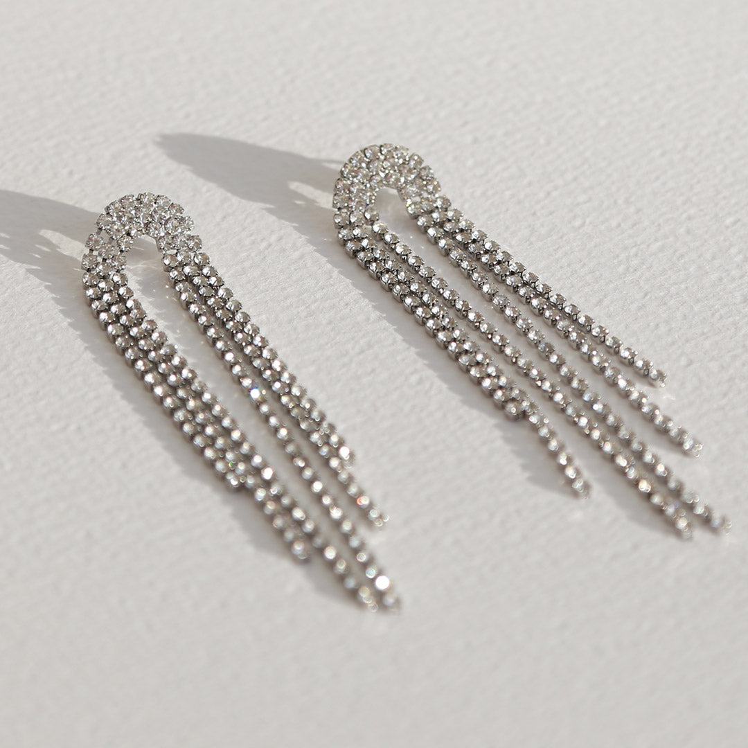 Earrings covered in diamonds oval