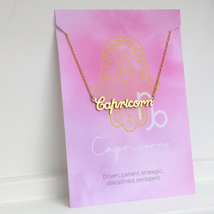 Gold necklace capricorn