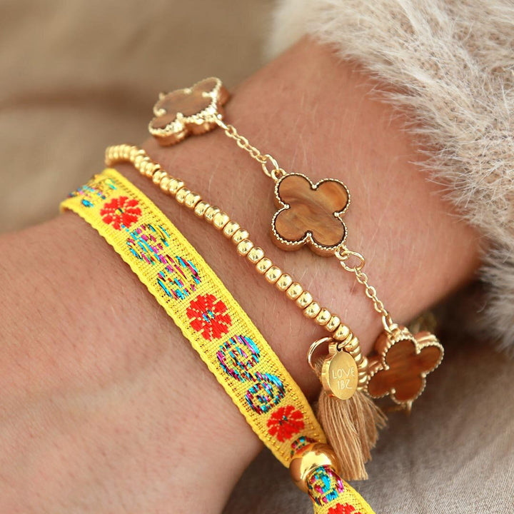 Woven bracelet flower yellow