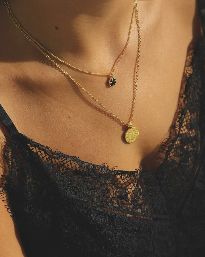 Gold necklace lucky clover